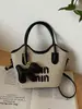 Bolsas de Mujer Transfronterizas 2026 Nueva Moda Tendencia Bolso Cubo de Paja con Letras Versátil Bolso de Hombro y Cruzado para la Playa
