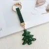 Llavero colgante de Navidad con pedrería de arcilla transfronteriza con reno, árbol de Navidad y bastón de caramelo con adornos de pedrería