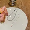 2025 Nuevo Collar de Perlas Colgante de Amor para Mujer Diseño de Nicho Cadena de Clavícula de Alta Gama Moda El Más Fácil de Combinar Accesorios