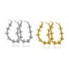 Corea del Sur Dongdaemun aretes espirales de acero de titanio de alta calidad, metal de lujo ligero, bambú, acero inoxidable en forma de U ovalada