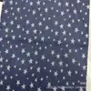 Tela de mezclilla lavada con estrellas de cinco puntas para pantalones, chaquetas, bolsos, sombreros, ropa infantil, ropa de mujer y venta al por mayor de prendas de vestir