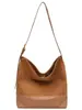 La popular bolsa para mujer de comercio exterior de este año es una bolsa tipo cubo de gran capacidad 2026 nueva de otoño e invierno superventas para llevar al hombro y cruzada