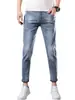 Jeans skinny slim fit novo de primavera para homens, calça cropped estilosa versátil da moda para jovens, com 9 pontos de comprimento e stretch