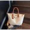 Bolsa Tote de Lona Versátil Nova 2025 Transfronteiriça Cor Contrastante Grande Capacidade Portátil Bolsa Transversal Feminina Nicho Retro