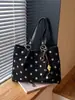 Bolsa de mano transfronteriza con lunares esmerilados para mujer, nuevo estilo 2026, diseño único, ligera, adecuada para ir al trabajo y con gran capacidad