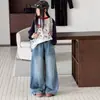 Pantalones vaqueros anchos estilo coreano de dibujos animados para niñas, nuevos y modernos jeans infantiles de otoño 2026