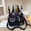 Bolsa feminina transfronteiriça de grande capacidade 2026 Europeia e Americana, bolsa de maternidade, bolsa de ombro em tecido Oxford, bolsa de mão, bolsa de viagem, bolsa transversal