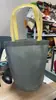 Bolsa de cubo no tejida bolsa de fondo redondo bolsa tote para ropa nueva moda bolsa tote para ropa de niños se puede personalizar LOGOTIPO