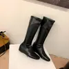 Aumento de altura interior de 4 cm ~ Nuevas botas de moda otoño e invierno con punta redonda, cuero suave, elásticas, adelgazantes, versátiles, de media pantorrilla para mujer