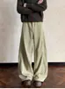 Calça Jeans Scimitar Desconstruída em Patchwork Estilo Americano para Homens, Silhueta Reta Solta, Calça de Perna Larga Versátil para Adolescentes