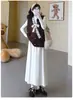 Conjunto de maternidad "Tingye Xunxu" chaleco blanco, top sin mangas texturizado de cuello en V estilo vintage de otoño y falda larga