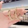 Pendientes Metálicos Modernos Coreanos Electrochapados Nuevo Estilo 2021 Pendientes de Borla para Mujer