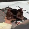 Presilha de cabelo de lã xadrez estilo coreano com laço, tamanho pequeno, para mulheres, outono/inverno, presilha para franja lateral, novo modelo de presilha tubarão 2026