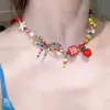 Estilo nuevo de primavera y verano, cadena para clavícula con colgante de florcitas de colores, collar para mujer con colgante de manzana roja lindo