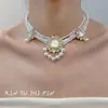 Conjunto de Colar e Brincos Pérola Multicamadas Pingente Gota d'Água Retrô Francês Acessórios de Vestir de Luxo Acessível Nicho High-End para Mulheres
