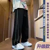 Pantalones con forro polar para hombre marca moderna invierno nuevo gruesos cálidos de pierna recta casuales para hombre joven holgados de pierna ancha largos