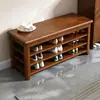 Banco de troca de sapatos de madeira maciça para a entrada, um banco de sapatos onde se pode sentar com um sapateiro de três prateleiras, sapateiro e banco integrados para uso doméstico