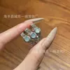 Atacado do Fabricante Anel de Renda de Jade Azul Natural Xiaohongshu com Cravação em Prata S925, Estilo Luxo Leve Europeu e Americano para Mulheres