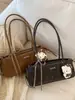 Bolsa de Mão de Luxo de Nicho para Mulheres, Nova Bolsa de Trabalho Grande Capacidade Vintage Outono e Inverno 2025, Bolsa Transversal Super Popular