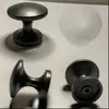 Aleación de Zinc Bronce Simple Muebles Agujero Único Gris Negro Cabeza Redonda Puerta de Gabinete Cajón Sólido Pequeño Tirador Tirador