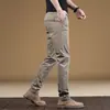 Pantalones Casuales Ajustados Hong Kong Primavera y Otoño 2026 para Hombre Rectos Ajustados Elásticos Versátiles Caqui Pantalones Largos para Hombre