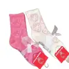 Calcetines de media pantorrilla Hello Kitty Calentitos de felpa gruesa Calcetines para el suelo del hogar Chica de dibujos animados linda japonesa Dulce