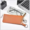 Bolsa Portátil para Guardar Óculos de Sol Pendurados Bolsa de Armazenamento para Óculos de Sol em PU Estojo para Óculos Bolsa Pendurada para Óculos com Chaveiro Conveniente