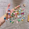 Celebridad de Internet Ins Pulsera de Pulsera de Cuentas de Dibujos Animados Japoneses y Coreanos Linda Cadena de Teléfono Móvil de Té con Leche Llavero Regalo Venta al por Mayor