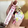 Nuevo Estilo Taza de Té de Leche Llavero Relleno de Aceite Color Macarrón Correa de Muñeca de Goma Suave Llavero de Coche Colgante para Mochila Femenina