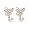Pendientes de botón en forma de mariposa con aguja de plata s925, muy brillantes, de lujo ligero, con circonita, personalidad, moda, de alta gama, simples, versátiles, para mujer