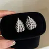 Elegante HerederaEstilo Fresco Bolso de Lunares Plateados Arete Arete Único Mujer 2026 Aretes Súper Hermosos