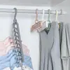 Perchero multifuncional, tendedero de nueve agujeros, perchero plegable para pantalones sin marcas, herramienta de organización y almacenamiento para dormitorio, tendedero giratorio al por mayor