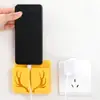 Soporte de carga para teléfono móvil Estante de almacenamiento Caja de almacenamiento Caja para colgar en la pared Control remoto de TV y aire acondicionado Pegatina de mesita de noche Sin perforación