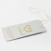 Nossa Fábrica Personaliza Cartolina Branca, Papel Couché e Outras Etiquetas para Roupas, Sapatos e Meias. Etiquetas Personalizadas Podem Ser Adicionadas com Logo, Impressão Colorida, Hot Stamping e Relevo