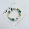 Pulsera de Cerámica Jingdezhen Nueva Historieta China Pulsera Boutique Venta al por Mayor Estudiante Joker Explosiones Puesto del Mercado Nocturno Pulsera