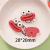 Desenho animado criativo tridimensional boca de salsicha olhos feios fofos resina acessórios feitos à mão material de grampo de cabelo cola de creme de cocô atacado