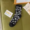 Novas meias de fleece de coral com estampa de leopardo, comprimento até o meio da panturrilha, outono e inverno, quentes, espessadas, para o chão, estilo japonês, com boca de bolha, meias de confinamento para mulheres
