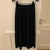 Falda midi de punto suave gris oscuro para mujer, otoño/invierno 2026, de cintura alta, fluida, falda de lana línea A plisada