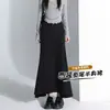 Falda negra estilo traje de cola de pez para mujer, nueva colección de otoño, adelgazante, versátil, elegante falda midi, falda ajustada al cuerpo