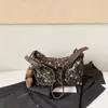 Estilo perezoso bolso pequeño plisado estampado de leopardo para mujer 2026 nuevo bolso de mano retro otoño e invierno sensación de alta gama bolso cruzado con correa ancha