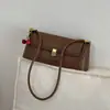Bolso de Diseñador de Nicho para Mujer Otoño/Invierno 2026 Nueva Moda Bolso de Hombro Único Bolso de Axila Bolso Baguette de Nuevo Estilo para Mujer Celebridad de Internet