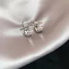 Pendientes de flor de copo de nieve de aguja de plata con circonita y perla, pendientes geométricos de lujo ligero de alta gama, pendientes versátiles y elegantes para mujer