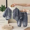 Conjunto de Niña Primavera y Otoño 2026 Nuevo Elegante Infantil Estampado de Leopardo Mezclilla Manga Larga Conjunto de Tres Piezas Moderno Venta al por Mayor