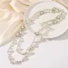 Colección Larga de Collares Superpuestos de Perlas Swarovski para Mujer, Estilo Lujo Ligero, Cadena Versátil para Suéter con un Toque de Alta Gama, Venta al por Mayor Otoño e Invierno