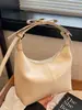 Bolso de Mujer 2026 Nuevo de Moda Textura de Moda Nicho Verano Versátil Hebilla Bolso de Hombro Cruzado Bolso de Bollo de Moda