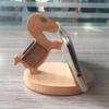 Soporte de madera para teléfono móvil creativo Pony teléfono móvil caballo espalda moneda Haya persona perezosa soporte para teléfono móvil logotipo grabado