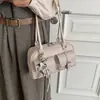Bolsa de bolos texturizada de mano para mujer, nuevo modelo de otoño 2026, bolso de hombro y axila de moda versátil de lujo ligero