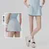 Shorts de Yoga Feminino Casuais para Uso Externo Cintura Elástica Saia-Shorts Fitness com Bolsos Laterais Soltos Respiráveis Shorts Esportivos para o Verão