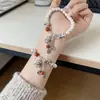 Pulseira de Buda da Paz Estilo Chinês Retrô para Mulheres, Novo Design de Nicho com Sensação de Alto Padrão, Luxo Leve, Acessório de Mão Único e Versátil para Mulheres
