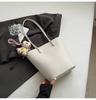 Bolsa Saco de Ombro Único com Textura de Alta Qualidade e Fashion para Mulheres 2025 Novo Estilo Coreano Versátil Bolsa de Mão Tote